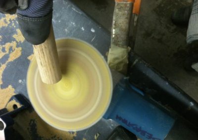 Wooden Dowels Being Sanded